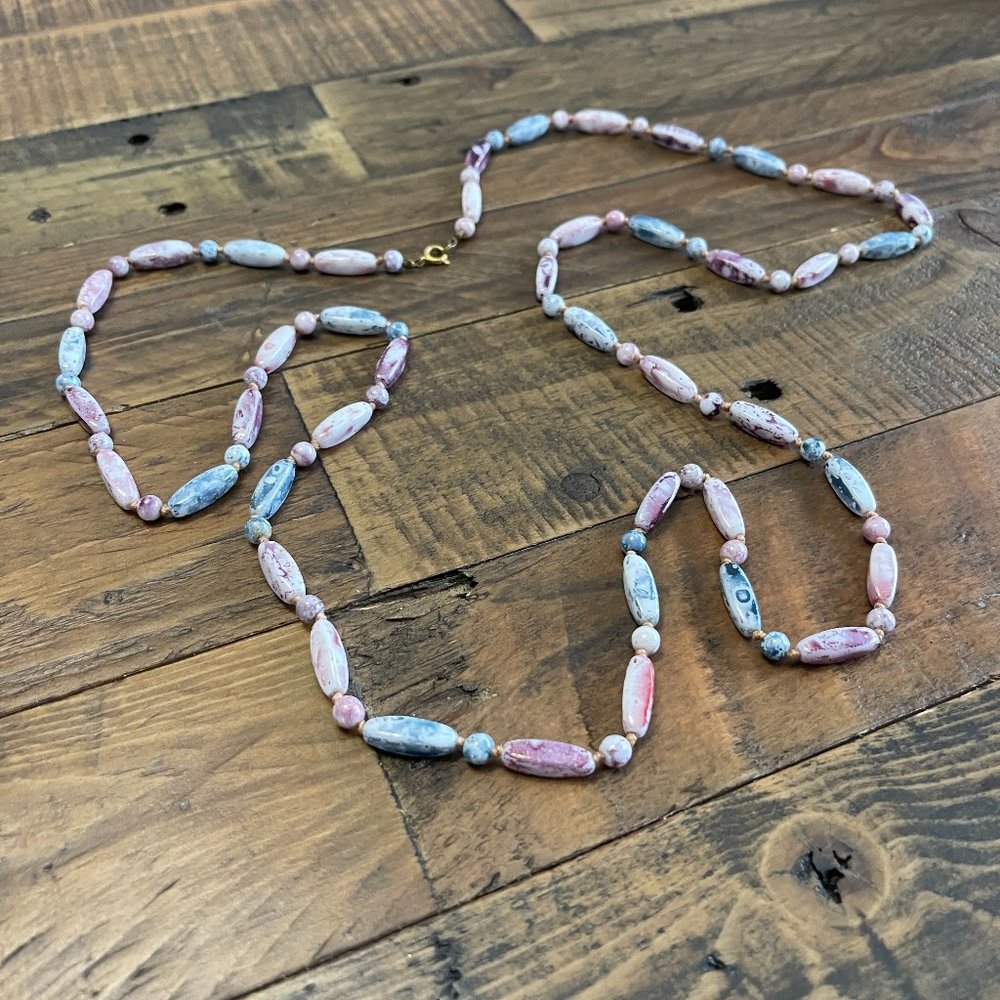 Vintage glass bead necklace in neutral color pallet.